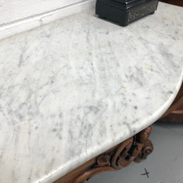 19th Century Louis XV style beautifully carved console table. With detailed ornate carving and a beautiful marble top. In good original detailed condition.