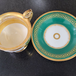 “Old Paris Porcelain” large cup and saucer with hand painted river landscape featuring castles. Gilt and enamel decoration. Circa: early 19th Century. In good original condition please view photos as they help form part of description.