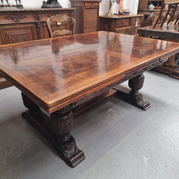 Renaissance style Oak extension table with parquetry top and twin pedestal base. The table extends by pulling out an extension leaf either side making it 287 cm long. Sourced from France and in good original detailed condition.