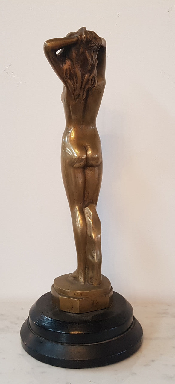 Here we have a lovely circa 1930's solid Art Deco bronze statue of a female on a wooden base. In good original condition.