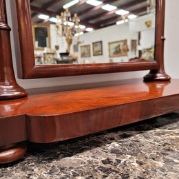 Antique Mahogany dressing table mirror. The mirror is still in good condition and tilts back and forward. It is in overall good original condition. Please view photos as they help form part of the description.