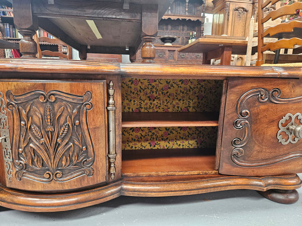 Appealing French Louis XVth style walnut converted TV unit.  Central carved  door & 2 Sliding Cupboards. In good condition.