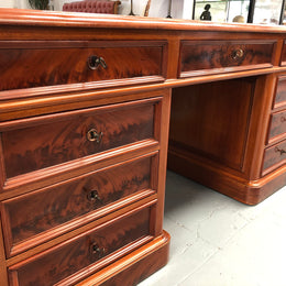 Antique French Mahogany and leather inset top double pedestal partners desk. Plenty of storage space with 9 long drawers on one side and space for someone to sit on the other side. In good restored condition. Circa 1880's.