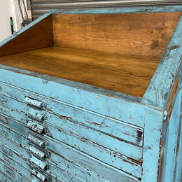 Fabulous set of vintage painted blue printers drawers that have adjustable separators which can be taken out for large papers. The drawers are various sizes and there is a section on top for working on or for storing brushes or tall items . These would be perfect for artists or jewellery pieces or even architects. Such a beautiful piece of industrial furniture.