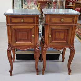Pair of Walnut Louis XV style grey marble top bedside cabinets. Single drawer, one cupboard and lovely French cabriole legs. They have been sourced from France and are in good original condition.