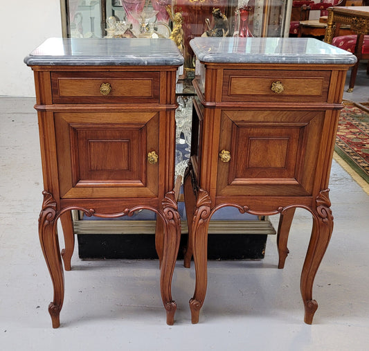 Pair of Walnut Louis XV style grey marble top bedside cabinets. Single drawer, one cupboard and lovely French cabriole legs. They have been sourced from France and are in good original condition.