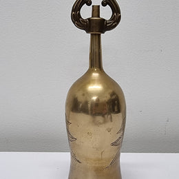 Vintage brass bell with incised decoration. It is in good original condition and has been sourced locally. Please view photos as they help form part of the description.