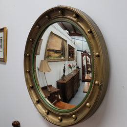 Large round French gilt framed convex mirror. It is a hard to find size with a total diameter of 67 cm. It has been sourced from France and is in good original condition.