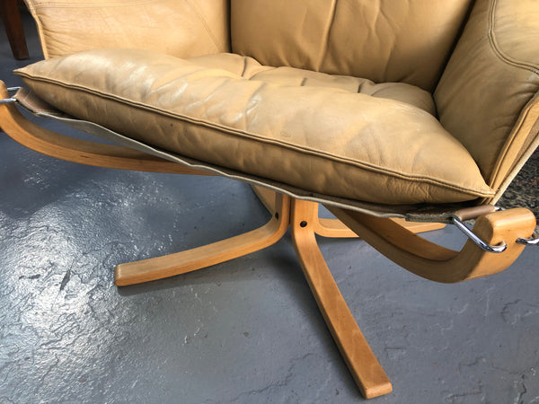 Fabulous Midcentury leather "Sigurd Ressell Falcon Chair" from Norway in good used condition with minor scratches to the leather consistent with age. Very sturdy and comfortable.