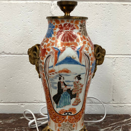Stunning Japanese Imari style base with detailed french ormolu mounts. It is in good original working condition.