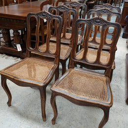 Fabulous set of 6 French oak dining chairs with cane seating in fantastic original condition.