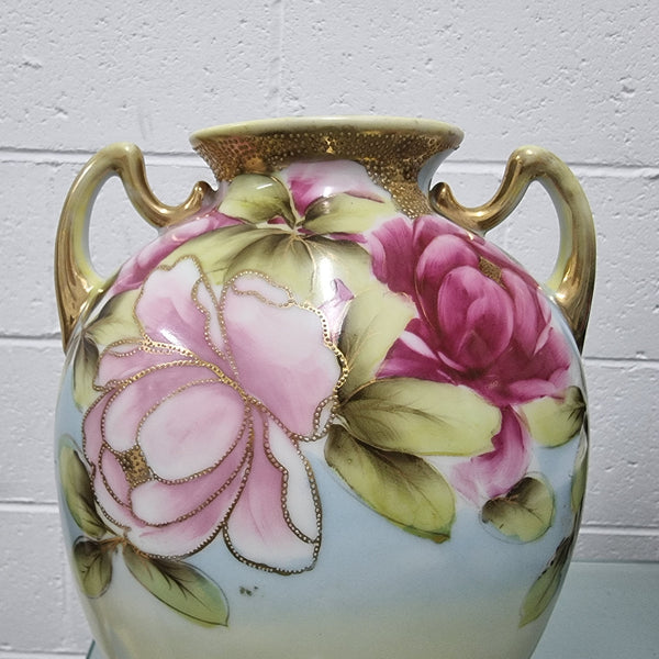 Lovely hand painted double handled vase in great original condition. Please see photos as it forms part of the description.