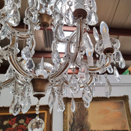 Sourced From France an attractive eight arm French crystal chandelier. It has been fully rewired to Australian standards and is in good original working condition.