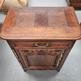 Louis 15th style oak 19th century cabinet with lovely brass hinges, handles & charming carving.  Circ: 1860's. In good original condition.