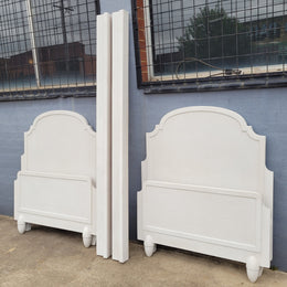 Two attractive vintage French chalk painted king single Art Deco beds. They have been sourced from France and are in good original condition.