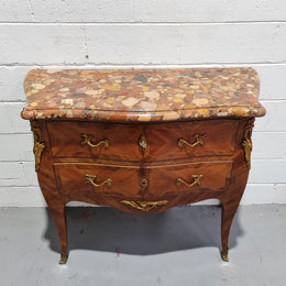 High quality French Mahogany Louis XVth style marble top commode. It has an eye catching marble top and is signed on body "J Bamelis". In very good original detailed condition.