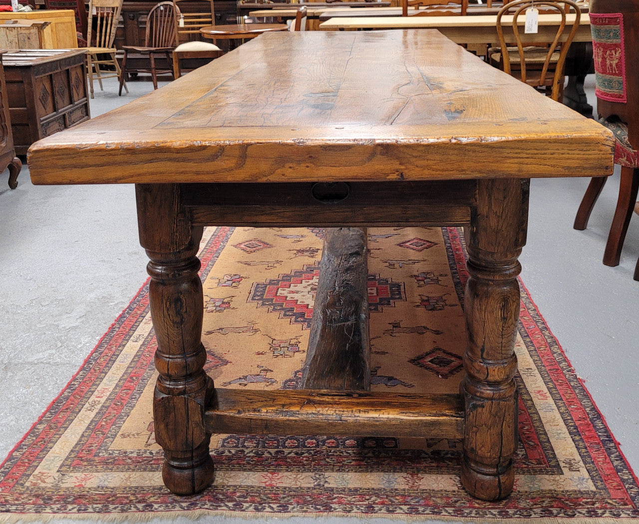 Large impressive 19th century 2.5 meter Antique French Oak farmhouse table. Loads of character with a stunning solid thick top and has a long drawer at one end. Sourced from France and in good original detailed condition.