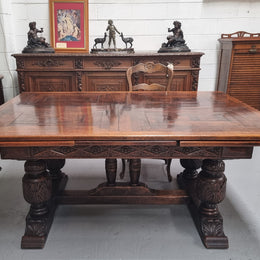 Renaissance style Oak extension table with parquetry top and twin pedestal base. The table extends by pulling out an extension leaf either side making it 287 cm long. Sourced from France and in good original detailed condition.