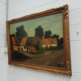 Fabulous signed French oil on canvas painting of a farmhouse scene in a beautiful Art Deco frame. It is in good original detailed condition.