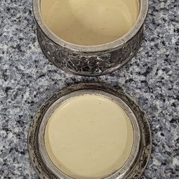 Unusual Antique silver over pottery Italian trinket box nicely decorated with Cherubs. It is in good original condition, please view photos as they help form part of the description.