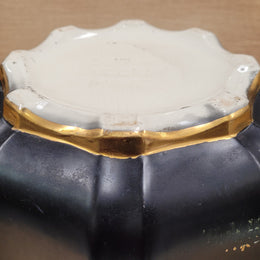 Stunning antique Jardinière with a black background and colorful oriental scene with gold trim. It is in good original condition It is in good original condition please view photos has they help form part of the description. Stamped "Olympic English Make"