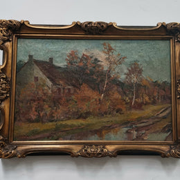 French signed country scene oil on canvas in a lovely decorative frame. In good original condition.