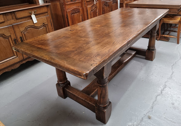 Lovely vintage French dark Oak pedestal base Farmhouse table. It can comfortable sit eight and it is in good original condition.