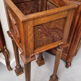 Wooden Arts and Crafts pedestal planter stand with decorative carvings. Sourced locally and is in good original condition.