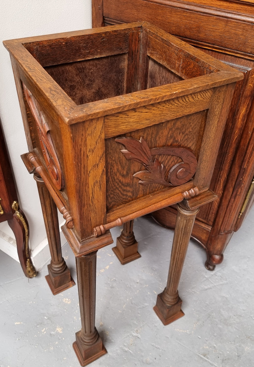 Wooden Arts and Crafts pedestal planter stand with decorative carvings. Sourced locally and is in good original condition.