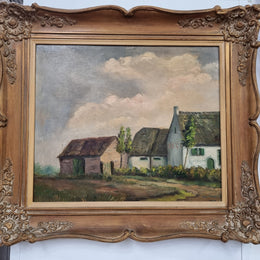 French signed oil on canvas depicting farmhouse in a lovely gilt frame. It is in good original detailed condition and has been sourced from France.