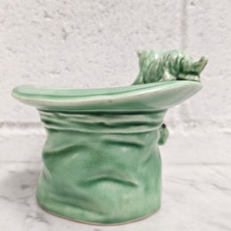 Vintage Sylvac number 1484 green cat and dog playing on top hat. Very cute and in very good condition, no chips or cracks. Please see photos as they form part of the description.