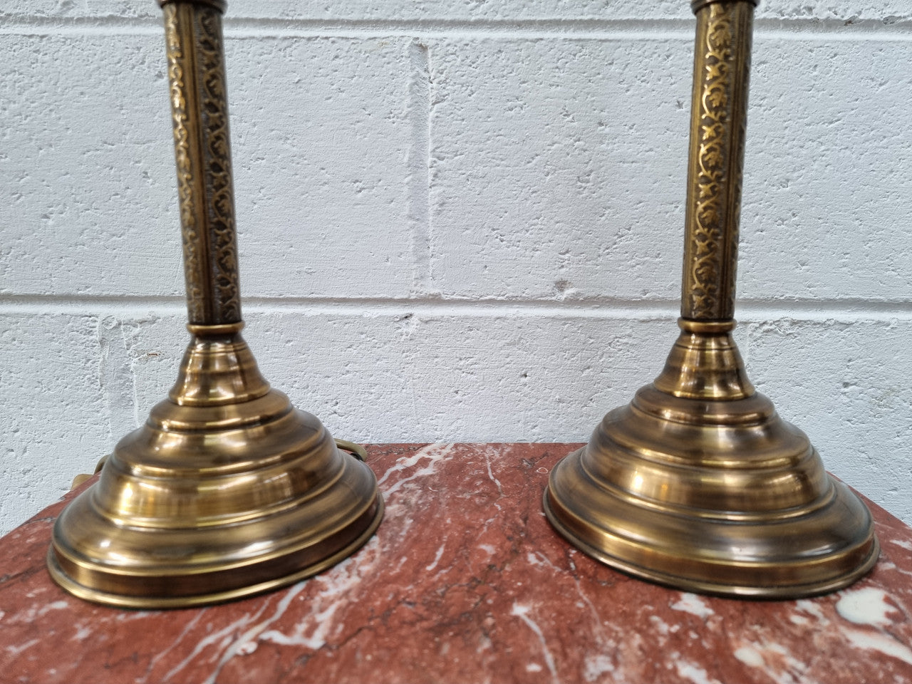 Pair of tall Antique style table lamps with glass floral etched shades. They have been sourced locally and are in good original detailed working condition.