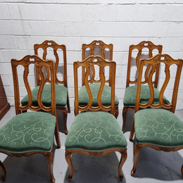Set of six French style Oak decorative upholstered seat dining chairs. They are comfortable to sit in and are in good original condition, please view photos of fabric as the fabric is in good used condition.