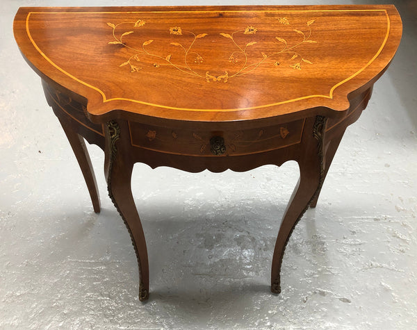 Stunning small inlaid French Walnut Louis XV style hall table with ormolu mounts and beautiful details. It has been sourced from France and is in good orignal detailed condition.