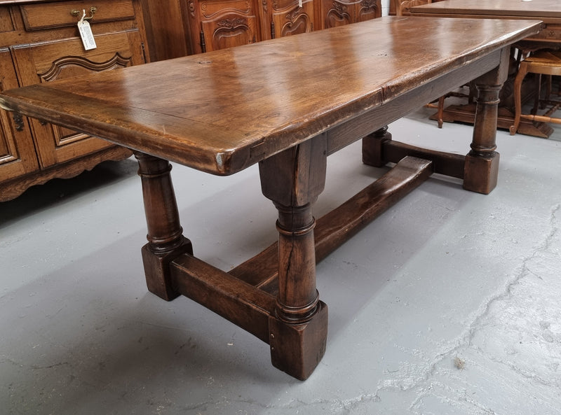 Lovely vintage French dark Oak pedestal base Farmhouse table. It can comfortable sit eight and it is in good original condition.