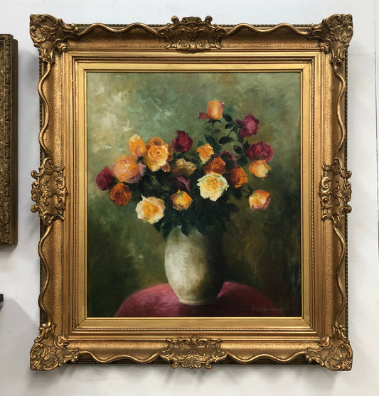 Vintage sourced in France, Belgium signed oil on canvas of a "Floral Study". Stunning vibrant colours and in a original gilt frame. In good original detailed condition.