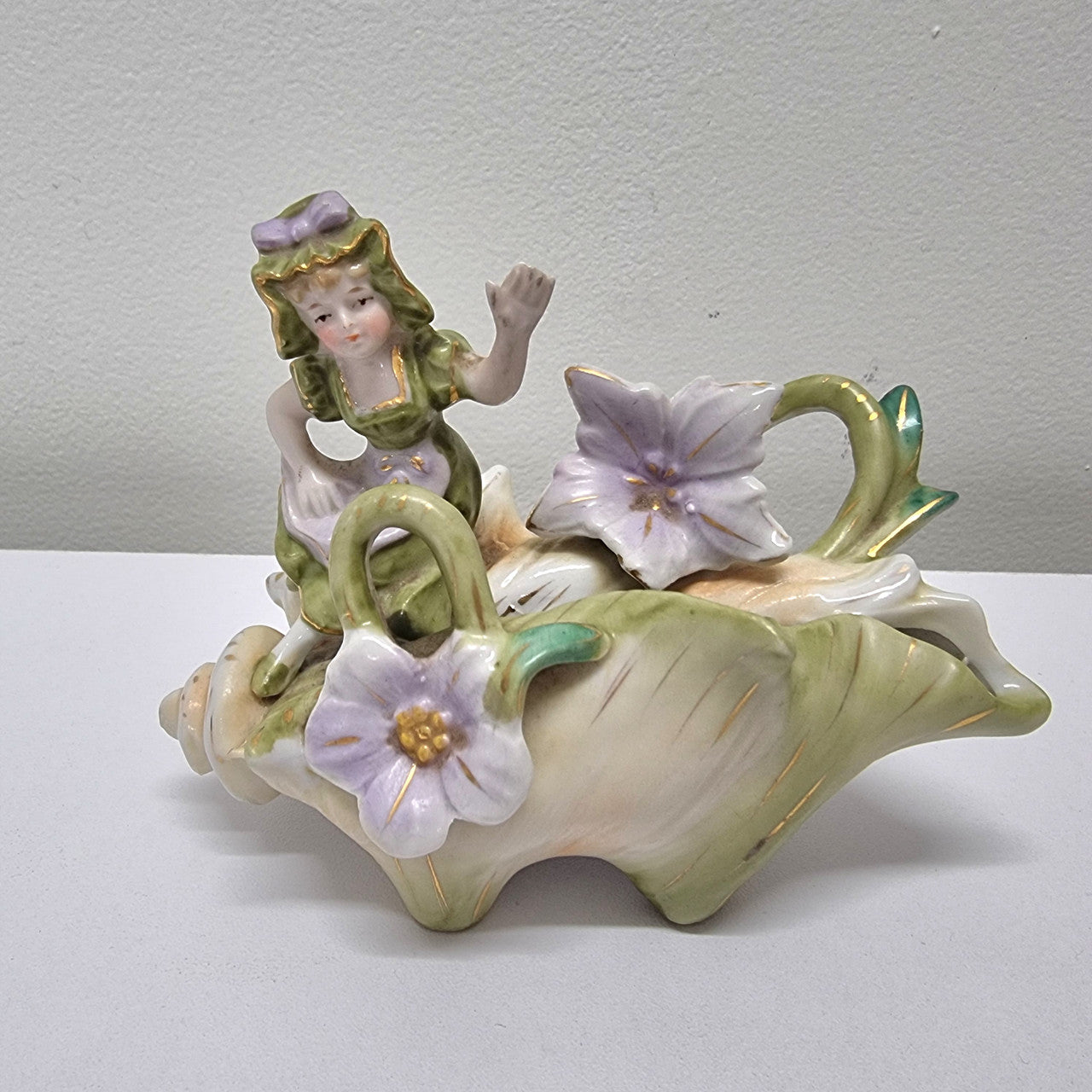 Charming Art Nouveau figural group. It has been sourced locally and is in good original condition. Please see pictures to form part of the description.