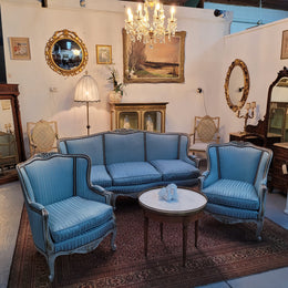 Well Proportioned Louis XV Salon Suite consisting of well proportioned 3 seater down cushioned, winged settee with 2 matching bergere chairs. All upholstered in stunning blue self stripe fabric. In excellent condition. Circa: 1930's.