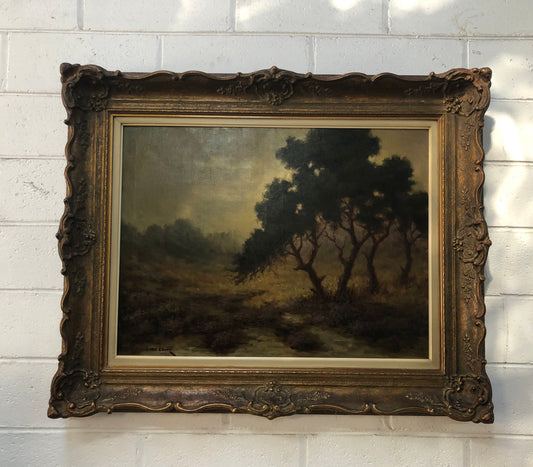 Sensational "Moody" oil on canvas landscape painting in a ornate gilt frame. In good original condition.