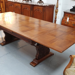 A beautiful French oak, Spanish style parquetry top extension table, with amazing carving and lovely details in very good condition.