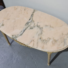 Charming painted Louis XVI style oval marble top coffee table. In good original detailed condition.