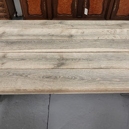 French stripped Oak pedestal stretcher base Farmhouse table with two drawers on either side of table. Features raw wood that could be used as is for a distressed look, or finished and waxed for a more refined look.