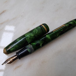 Conway Stewart  "Dinkie" 550 fountain pen green and black marble with 14k gold Nib .