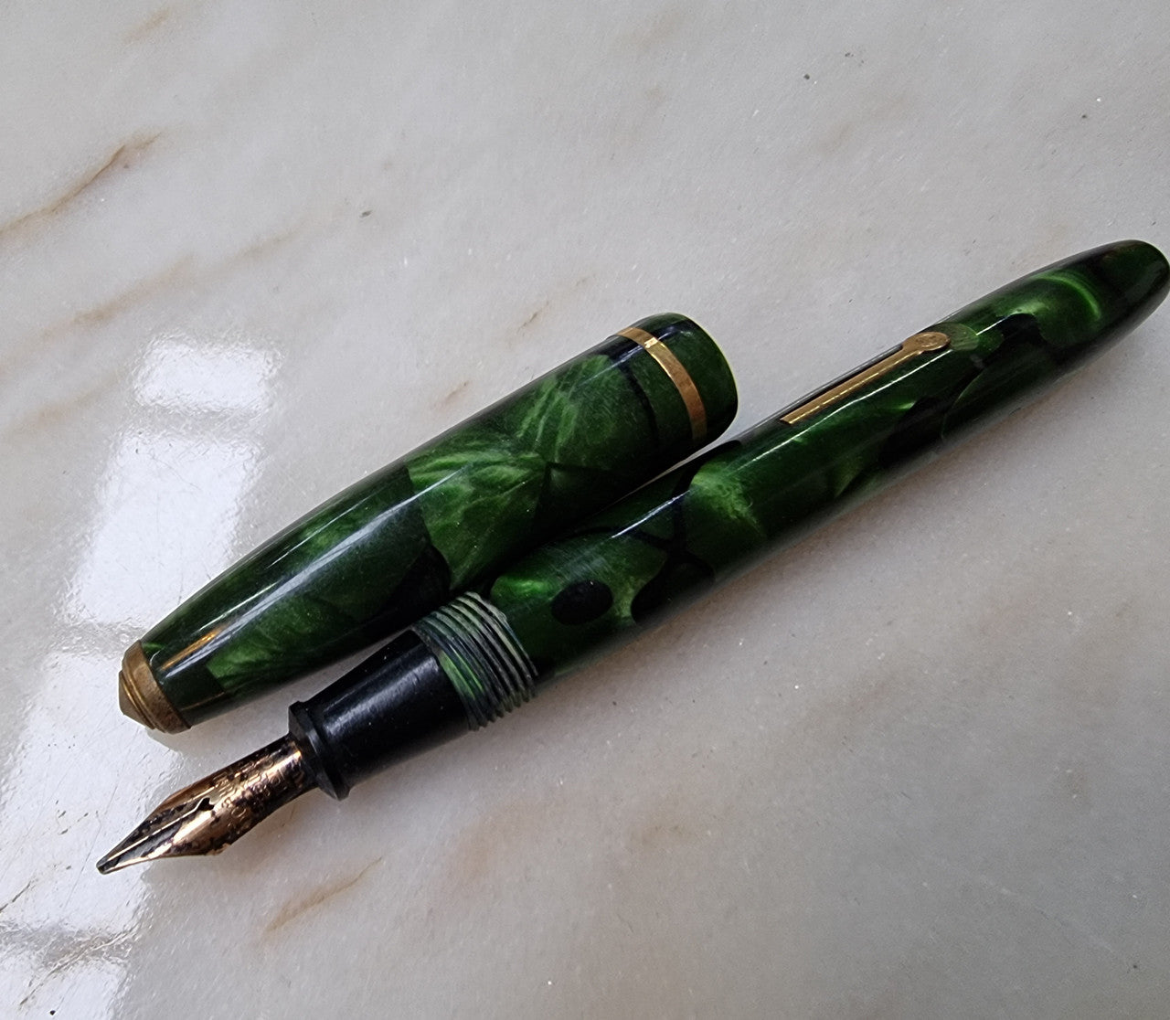 Conway Stewart  "Dinkie" 550 fountain pen green and black marble with 14k gold Nib .