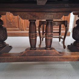 Renaissance style Oak extension table with parquetry top and twin pedestal base. The table extends by pulling out an extension leaf either side making it 287 cm long. Sourced from France and in good original detailed condition.