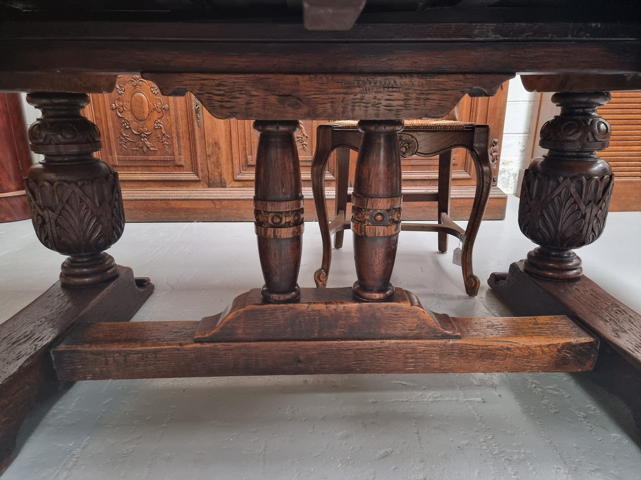 Renaissance style Oak extension table with parquetry top and twin pedestal base. The table extends by pulling out an extension leaf either side making it 287 cm long. Sourced from France and in good original detailed condition.