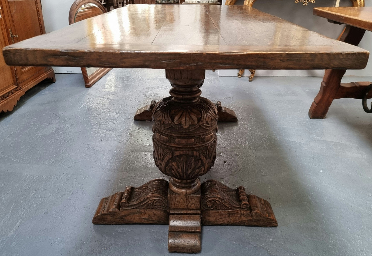 A beautifully carved 19th Century French Oak farmhouse table with a "bulbous base". It is in very good original detailed condition.