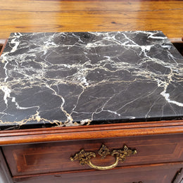 Appealing Louis XV style high quality bedside cabinets with black Portoro marble top and bronze mounts. They have been sourced from France and are in good original condition.