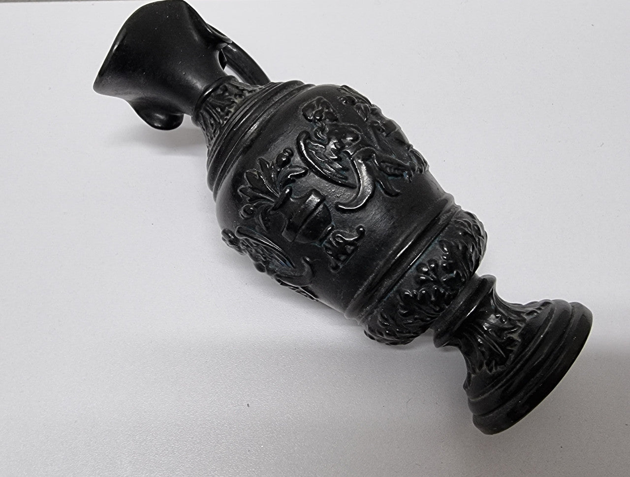 Victorian black urn shaped vase. It is in good original condition and has been sourced locally. Please view photos as they help form part of the description.