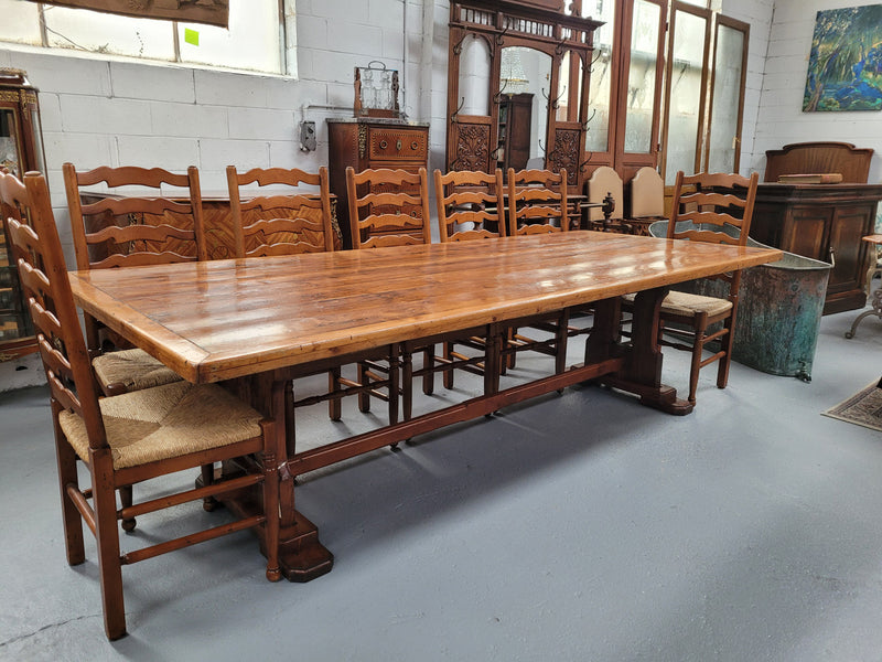 Reclaimed Pine and Oregon stretcher base dining table. The top has an amazing patina and character. Can very comfortable seat 12 and is in good original detailed condition .